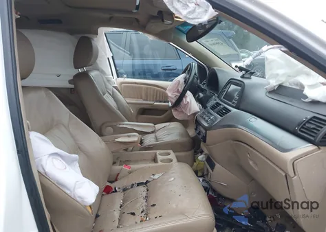 2009 Honda Odyssey Ex-L from USA, damaged, VIN 5FNRL38759B011690